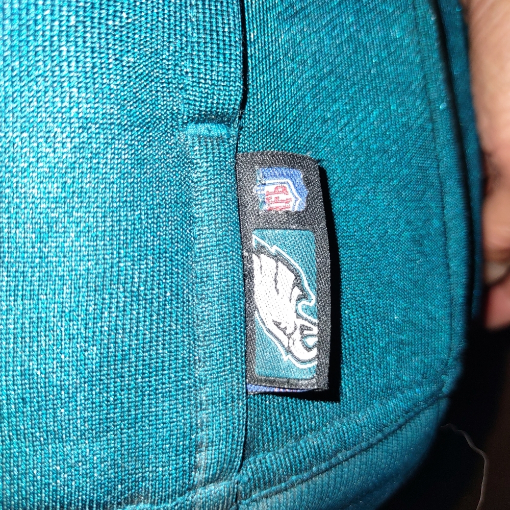 Woman's Philadelphia Eagles Official NFL hoodie pullover.  Front pocket.